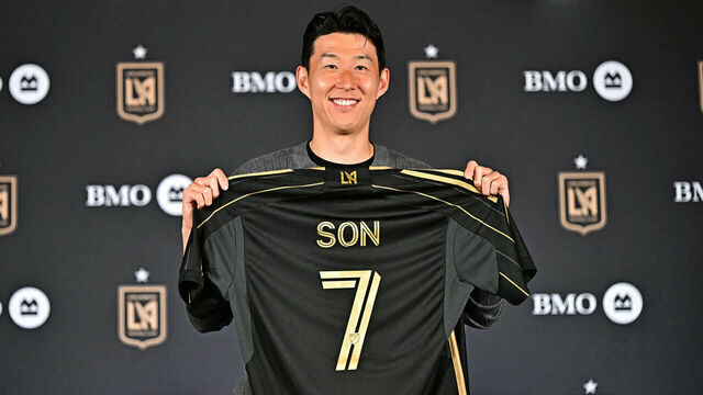 South Korean football player Son Heung-min holds his LAFC jersey during a press conference as he joins the Los Angeles FC (LAFC) at BMO Stadium's Field Club in Los Angeles on August 6, 2025. South Korea star Son Heung-min has signed for Los Angeles FC, bringing to an end his 10-year stay at Tottenham, both clubs announced on August 6, 2025. The 33-year-old will reportedly cost a Major League Soccer record $26 million transfer fee, according to ESPN and The Athletic.