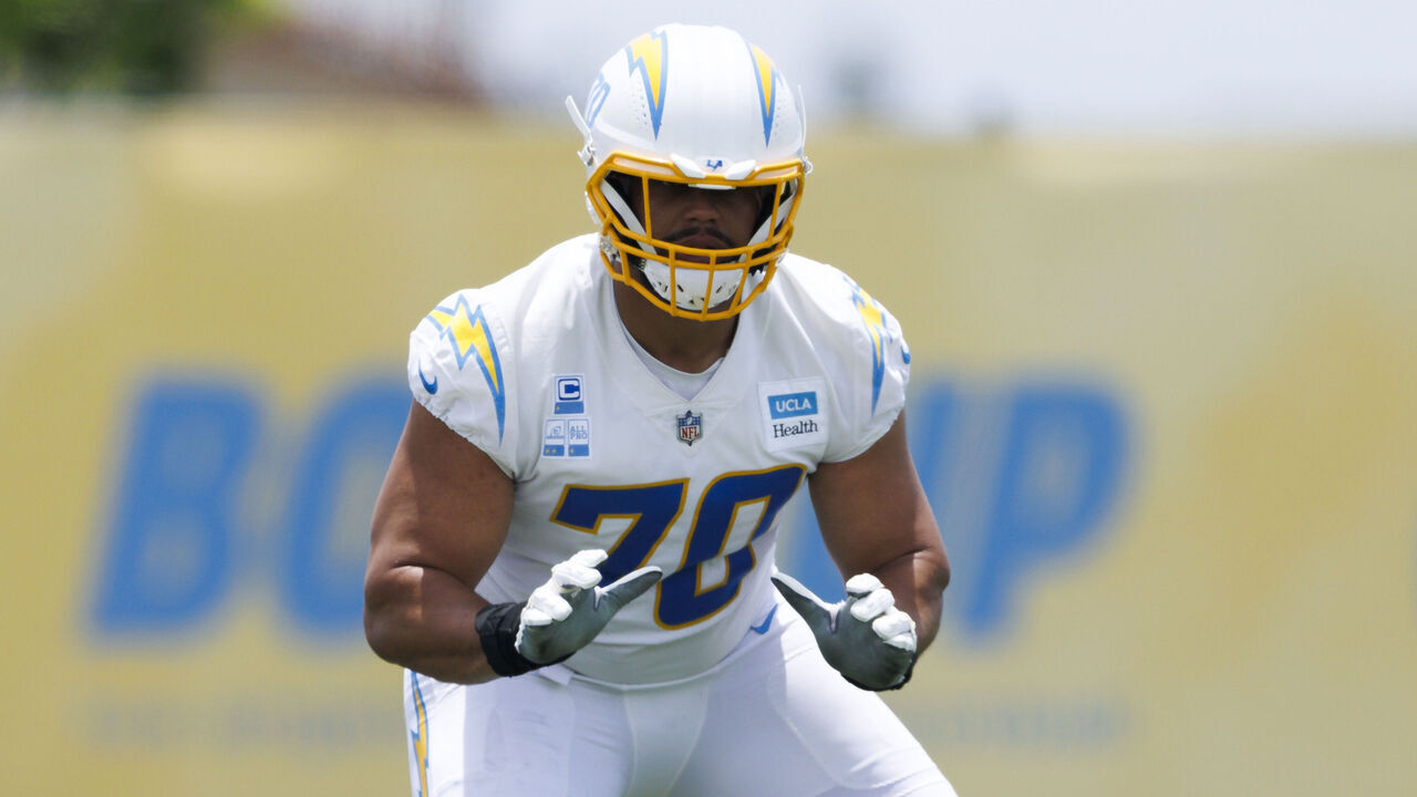 EL SEGUNDO, CALIFORNIA - JUNE 12: Rashawn Slater #70 of the Los Angeles Chargers blocks during mandatory minicamp at The Bolt on June 12, 2025 in El Segundo, California.