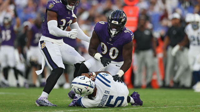BALTIMORE, MARYLAND - AUGUST 07: Quarterback Anthony Richardson Sr. #5 of the Indianapolis Colts lays on the ground after being sacked by linebacker David Ojabo #90 of the Baltimore Ravens in the first half during the NFL Preseason 2025 game between Indianapolis Colts and Baltimore Ravens at M&T Bank Stadium on August 7, 2025 in Baltimore, Maryland.