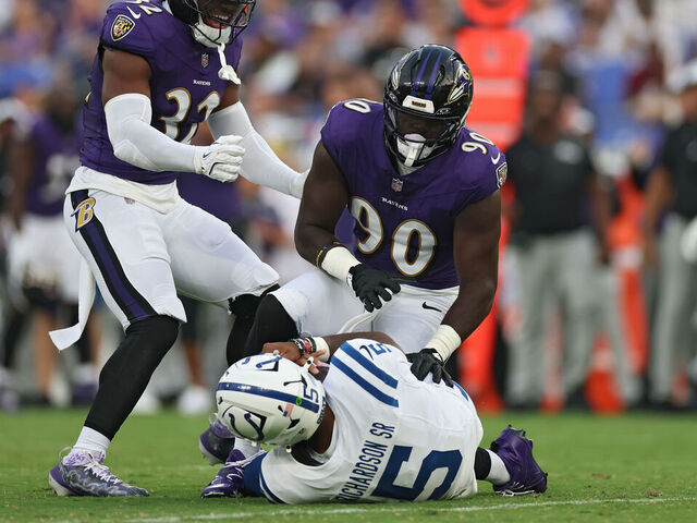 BALTIMORE, MARYLAND - AUGUST 07: Quarterback Anthony Richardson Sr. #5 of the Indianapolis Colts lays on the ground after being sacked by linebacker David Ojabo #90 of the Baltimore Ravens in the first half during the NFL Preseason 2025 game between Indianapolis Colts and Baltimore Ravens at M&T Bank Stadium on August 7, 2025 in Baltimore, Maryland.