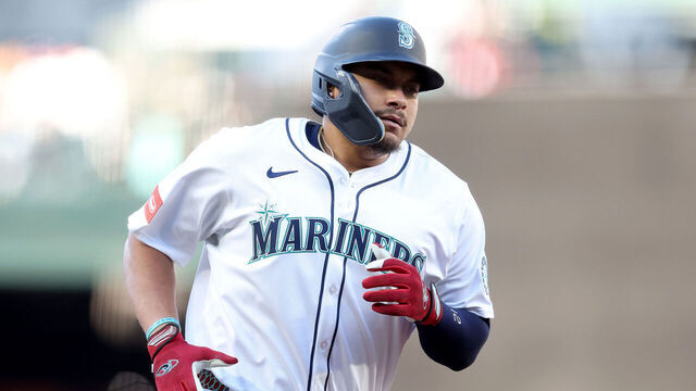 SEATTLE, WASHINGTON - AUGUST 06: Josh Naylor #12 of the Seattle Mariners rounds third base after his two run home run against the Chicago White Sox during the first inning at T-Mobile Park on August 06, 2025 in Seattle, Washington.