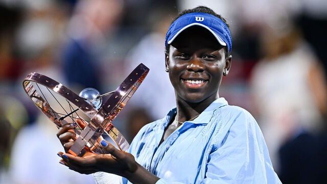 MONTREAL, CANADA - AUGUST 07: Victoria Mboko of Canada celebrates as she holds up the trophy following her victory against Naomi Osaka of Japan during the Women's Singles Final match on day twelve of the WTA 1000 National Bank Open at IGA Stadium on August 7, 2025 in Montreal, Quebec, Canada.