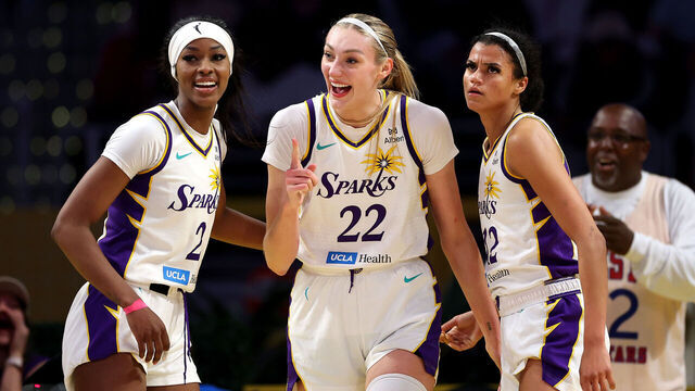 LOS ANGELES, CALIFORNIA - AUGUST 07: Cameron Brink #22 of the Los Angeles Sparks reacts with Rickea Jackson #2 and Rae Burrell #12 against the Connecticut Sun during the fourth quarter at Crypto.com Arena on August 07, 2025 in Los Angeles, California.