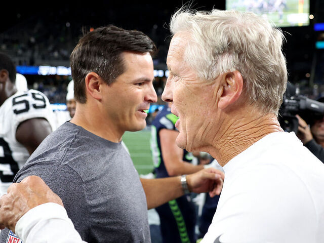 SEATTLE, WASHINGTON - AUGUST 07: Head coach Mike Macdonald of the Seattle Seahawks and head coach Pete Carroll of the Las Vegas Raiders shake hands after the NFL Preseason 2025 game between Las Vegas Raiders and Seattle Seahawks at Lumen Field on August 07, 2025 in Seattle, Washington.