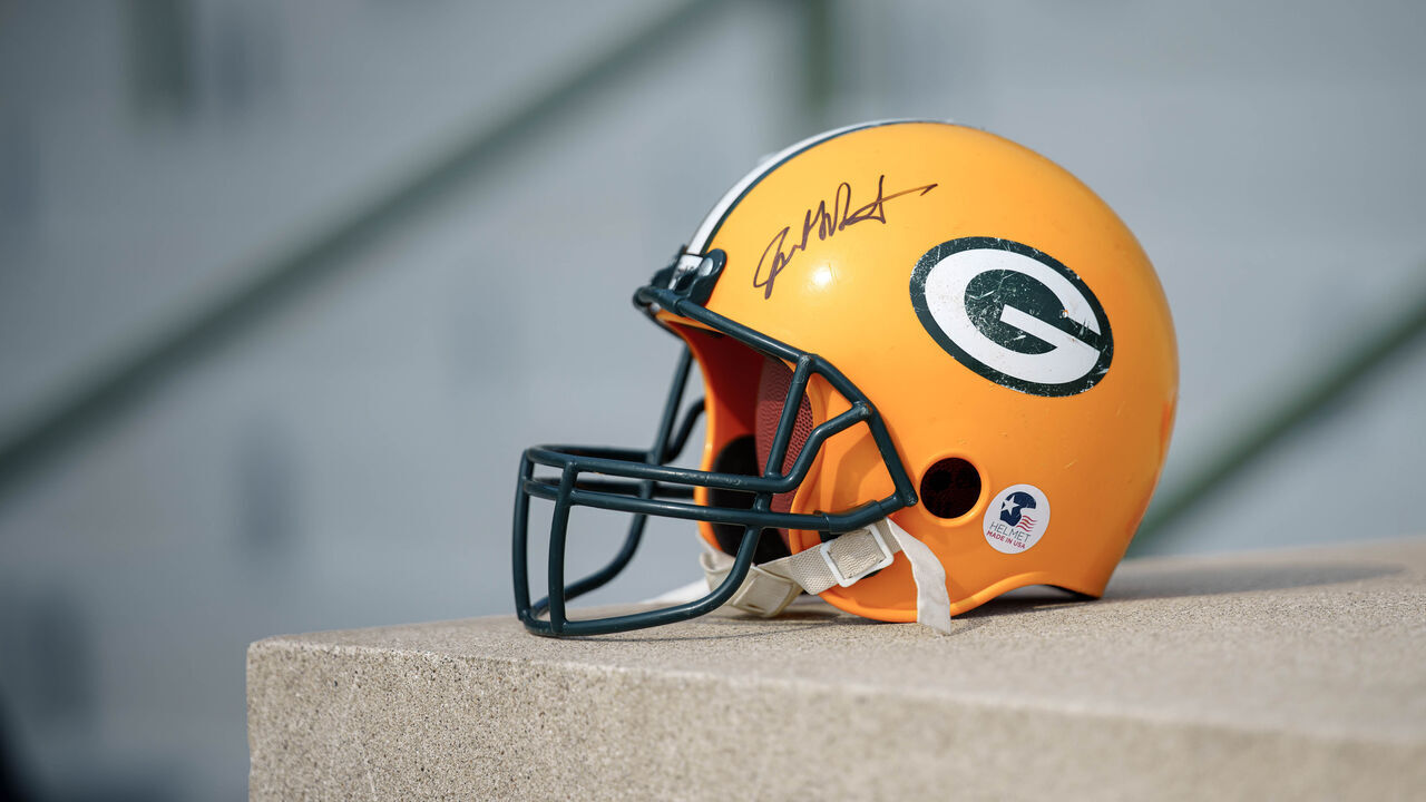 A Green Bay Packers helmet with a player autograph rests outside Lambeau Field before training camp practice in Green Bay, Wisconsin, on August 6, 2025.