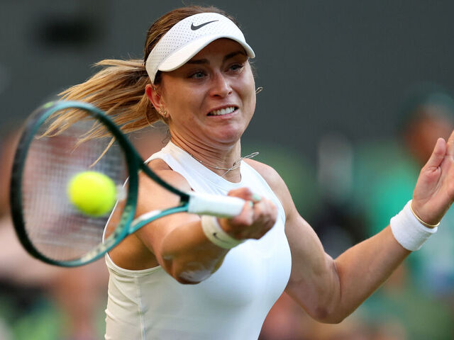 LONDON, ENGLAND - JUNE 30: Paula Badosa of Spain plays a forehand against Katie Boulter of Great Britain during the Ladies' Singles first round match on day one of The Championships Wimbledon 2025 at All England Lawn Tennis and Croquet Club on June 30, 2025 in London, England.