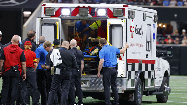 ATLANTA, GEORGIA - AUGUST 8: Morice Norris #26 of the Detroit Lions is tended to by medical staff during the fourth quarter of the NFL Preseason 2025 game between Detroit Lions and Atlanta Falcons at Mercedes-Benz Stadium on August 8, 2025 in Atlanta, Georgia.