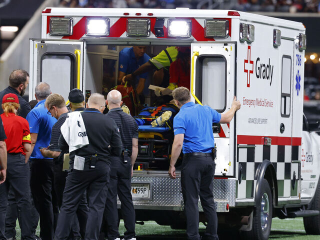 ATLANTA, GEORGIA - AUGUST 8: Morice Norris #26 of the Detroit Lions is tended to by medical staff during the fourth quarter of the NFL Preseason 2025 game between Detroit Lions and Atlanta Falcons at Mercedes-Benz Stadium on August 8, 2025 in Atlanta, Georgia.