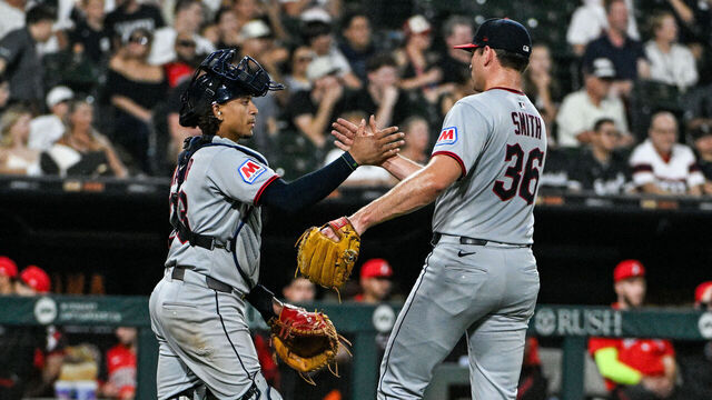 CHICAGO, ILLINOIS - AUGUST 08: Cade Smith #36 of the Cleveland Guardians and Bo Naylor #23 of the Cleveland Guardians high five at the conclusion of the game against the Chicago White Sox at Rate Field on August 8, 2025 in Chicago, Illinois.
