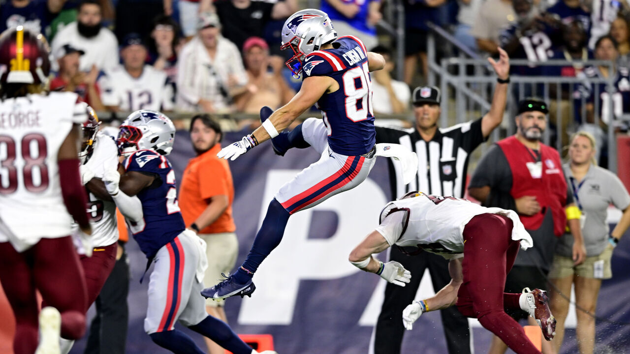 FOXBOROUGH, MASSACHUSETTS - AUGUST 08: Efton Chism III #86 of the New England Patriots scores a touchdown during the third quarter of the NFL Preseason 2025 game against Washington Commanders and New England Patriots at Gillette Stadium on August 08, 2025 in Foxborough, Massachusetts.