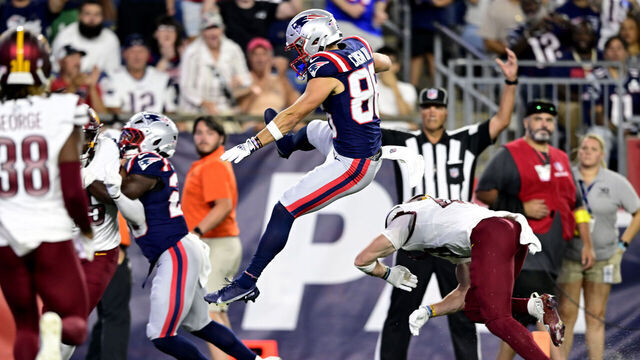 FOXBOROUGH, MASSACHUSETTS - AUGUST 08: Efton Chism III #86 of the New England Patriots scores a touchdown during the third quarter of the NFL Preseason 2025 game against Washington Commanders and New England Patriots at Gillette Stadium on August 08, 2025 in Foxborough, Massachusetts.