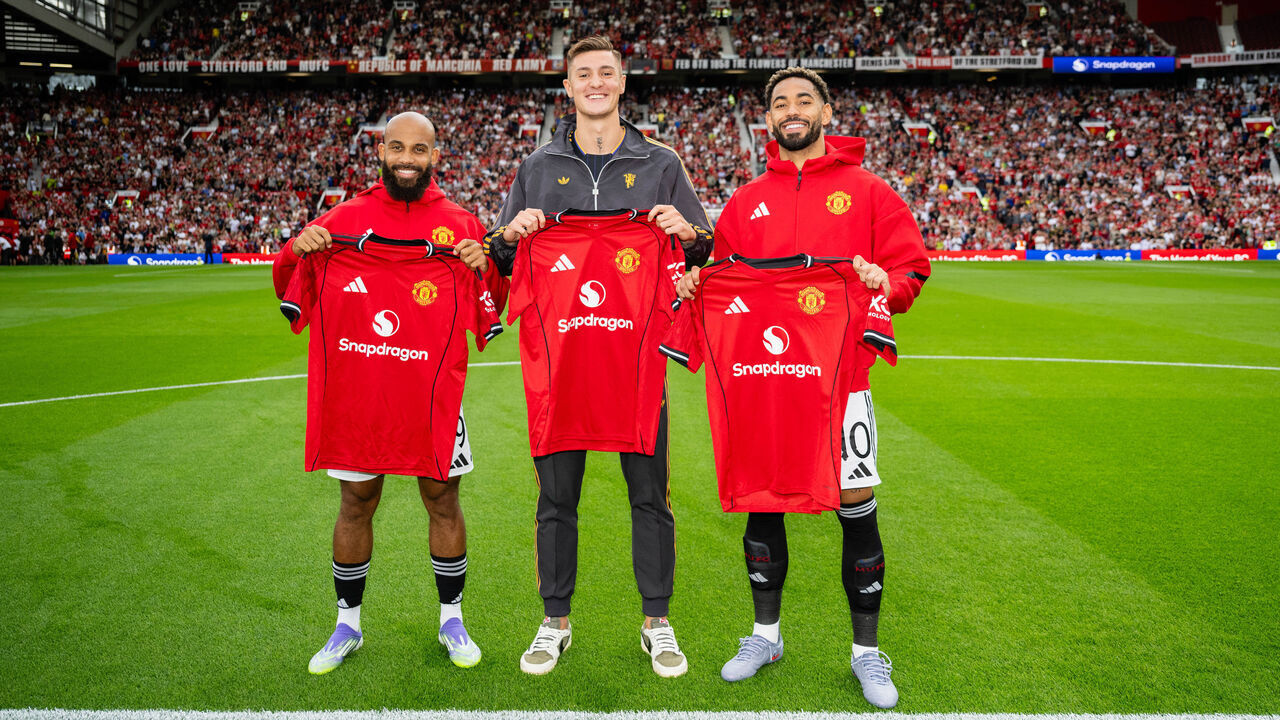 MANCHESTER, ENGLAND - AUGUST 9: (L-R) New Manchester United signings Bryan Mbeumo, Benjamin Sesko & Matheus Cunha pose together with team shirts prior to the pre-season friendly match between Manchester United and ACF Fiorentina at Old Trafford on August 9, 2025 in Manchester, England.