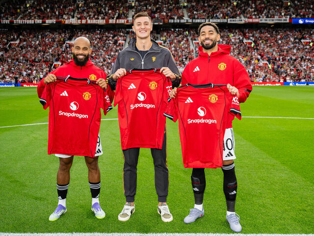 MANCHESTER, ENGLAND - AUGUST 9: (L-R) New Manchester United signings Bryan Mbeumo, Benjamin Sesko & Matheus Cunha pose together with team shirts prior to the pre-season friendly match between Manchester United and ACF Fiorentina at Old Trafford on August 9, 2025 in Manchester, England.