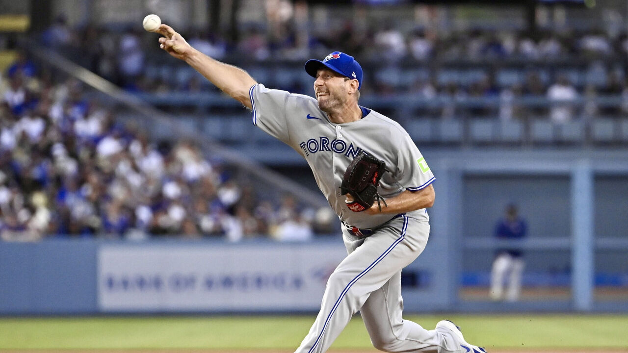 Los Angeles, CA - August 08: Starting pitcher Max Scherzer #31 of the Toronto Blue Jays throws to the plate against the Los Angeles Dodgers in the first inning during a baseball game at Dodger Stadium in Los Angeles on Friday, August 8, 2025.