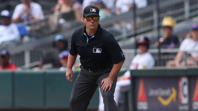 ATLANTA, GEORGIA - AUGUST 9: Umpire Jen Pawol #95 in action during a game between the Atlanta Braves and Miami Marlins in the first inning at Truist Park on August 9, 2025 in Atlanta, Georgia.