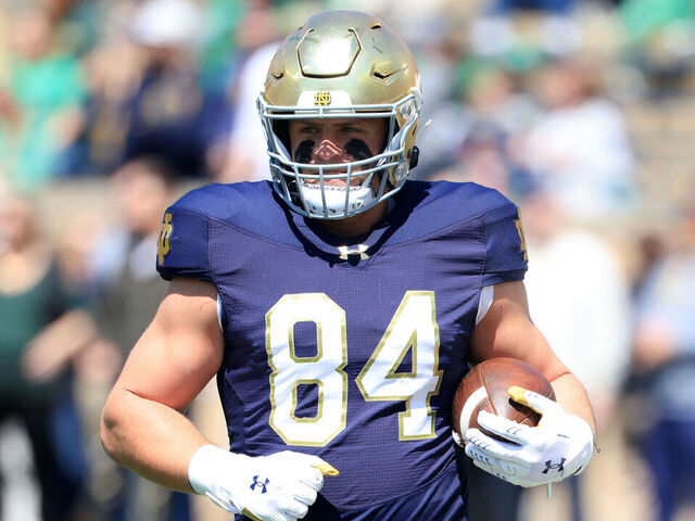 SOUTH BEND, INDIANA - APRIL 12: Kevin Bauman #84 of the Notre Dame Fighting Irish runs with the ball during the 94th Annual Notre Dame Blue-Gold Spring Game at Notre Dame Stadium on April 12, 2025 in South Bend, Indiana.