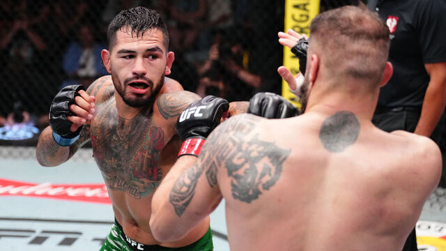LAS VEGAS, NEVADA - AUGUST 09: (L-R) Anthony Hernandez punches Roman Dolidze of Georgia in a middleweight fight during the UFC Fight Night event at UFC APEX on August 09, 2025 in Las Vegas, Nevada.