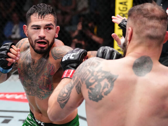 LAS VEGAS, NEVADA - AUGUST 09: (L-R) Anthony Hernandez punches Roman Dolidze of Georgia in a middleweight fight during the UFC Fight Night event at UFC APEX on August 09, 2025 in Las Vegas, Nevada.