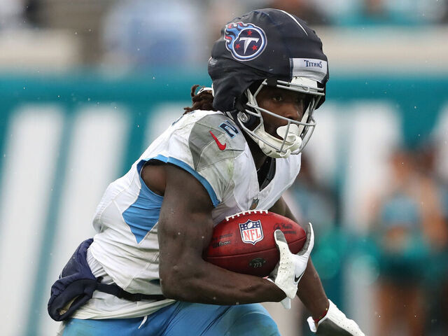 JACKSONVILLE, FLORIDA - DECEMBER 29: Tyjae Spears #2 of the Tennessee Titans carries the ball during the first half against the Jacksonville Jaguars at EverBank Stadium on December 29, 2024 in Jacksonville, Florida.