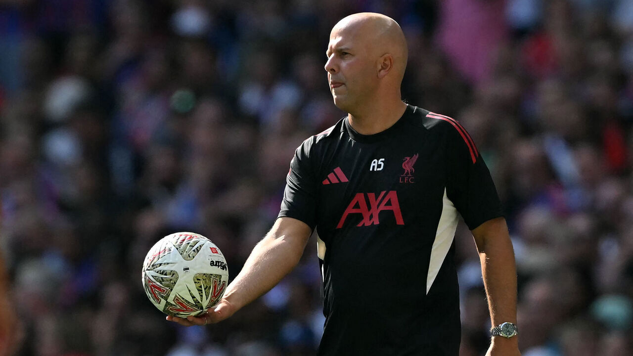 Liverpool's Dutch manager Arne Slot returns the ball during the English FA Community Shield football match between Crystal Palace and Liverpool at Wembley Stadium, in London on August 10, 2025.