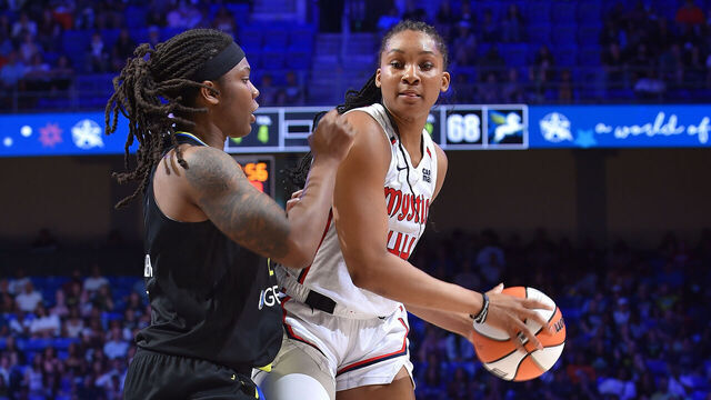 ARLINGTON, TX - AUGUST 10: Kiki Iriafen #44 of the Washington Mystics looks to pass the ball during the game against the Dallas Wings on August 10, 2025 at the College Park Center in Arlington, TX. Mandatory Copyright Notice: Copyright 2025 NBAE