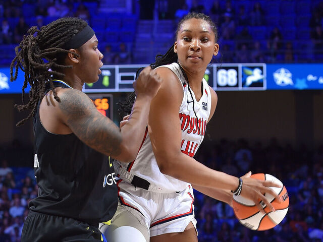 ARLINGTON, TX - AUGUST 10: Kiki Iriafen #44 of the Washington Mystics looks to pass the ball during the game against the Dallas Wings on August 10, 2025 at the College Park Center in Arlington, TX. Mandatory Copyright Notice: Copyright 2025 NBAE