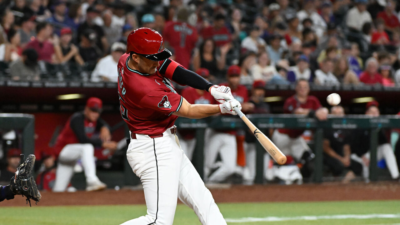 PHOENIX, ARIZONA - AUGUST 10: Connor Kaiser #65 of the Arizona Diamondbacks hits a double against the Colorado Rockies during the seventh inning at Chase Field on August 10, 2025 in Phoenix, Arizona. It was his first MLB hit.