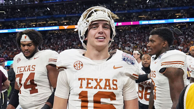 ATLANTA, GA - JANUARY 01: Quarterback Arch Manning #16 of the Texas Longhorns looks on after the Texas Longhorns versus Arizona State Sun Devils College Football Playoff Quarterfinal at the Chick-fil-A Peach Bowl on January 1, 2025, at Mercedes-Benz Stadium in Atlanta, GA.