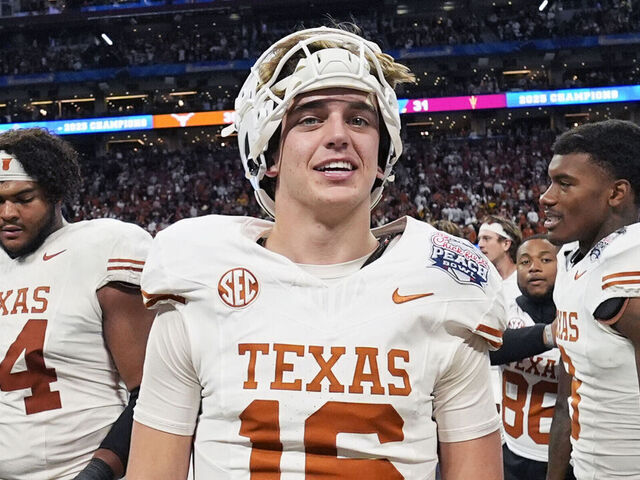 ATLANTA, GA - JANUARY 01: Quarterback Arch Manning #16 of the Texas Longhorns looks on after the Texas Longhorns versus Arizona State Sun Devils College Football Playoff Quarterfinal at the Chick-fil-A Peach Bowl on January 1, 2025, at Mercedes-Benz Stadium in Atlanta, GA.