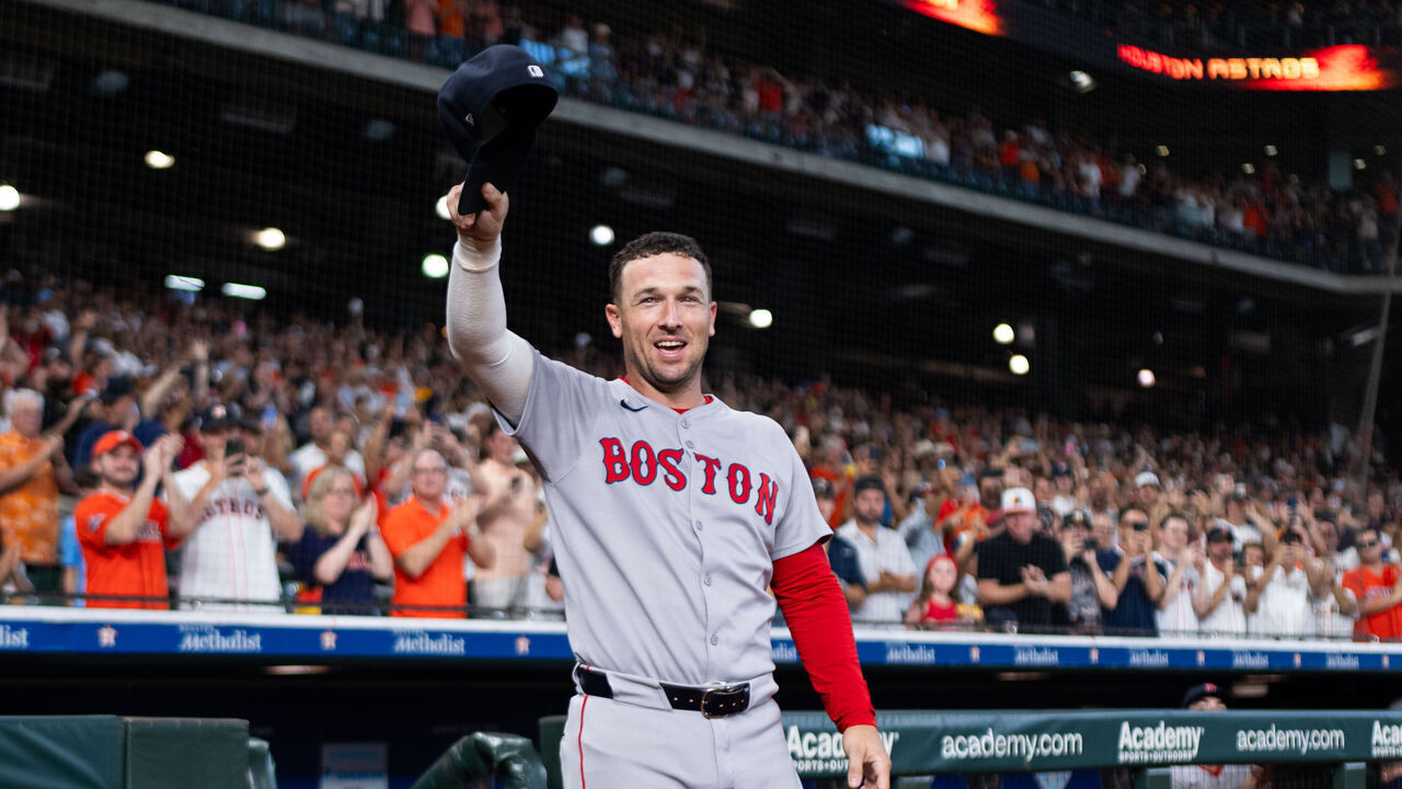 HOUSTON, TEXAS - AUGUST 11: Alex Bregman #2 of the Boston Red Sox acknowledges the crowd after a tribute video before a game against the Houston Astros at Daikin Park on August 11, 2025 in Houston, Texas.