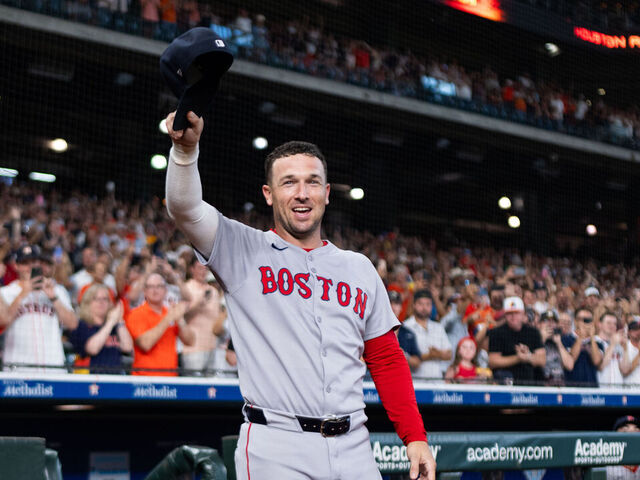 HOUSTON, TEXAS - AUGUST 11: Alex Bregman #2 of the Boston Red Sox acknowledges the crowd after a tribute video before a game against the Houston Astros at Daikin Park on August 11, 2025 in Houston, Texas.