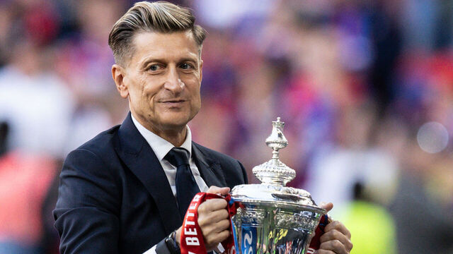 LONDON, ENGLAND - MAY 17: Crystal Palace's co-owner Steve Parish holds the trophy aloft during the Emirates FA Cup Final match between Crystal Palace and Manchester City at Wembley Stadium on May 17, 2025 in London, England.