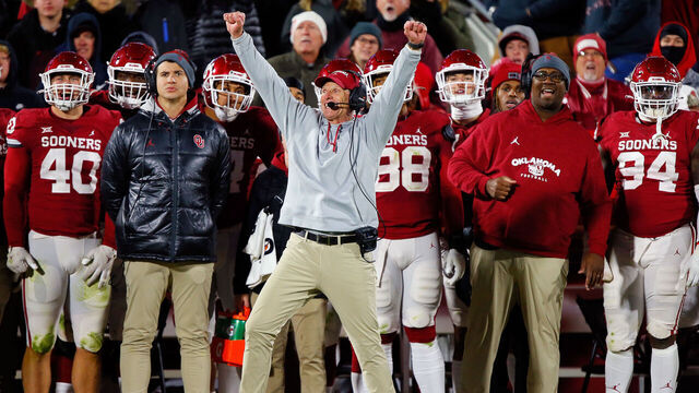 NORMAN, OK - NOVEMBER 19: Head coach Brent Venables of the Oklahoma Sooners celebrates after the defense broke up a pass by the Oklahoma State Cowboys to end their drive late in the fourth quarter during Bedlam at Gaylord Family Oklahoma Memorial Stadium on November 19, 2022 in Norman, Oklahoma. The Sooners won 28-13.