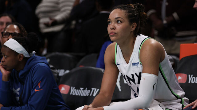 NEW YORK, NEW YORK - OCTOBER 20: Napheesa Collier #24 of the Minnesota Lynx looks on from the bench during overtime during Game Five of the WNBA Finals at Barclays Center on October 20, 2024 in New York City.