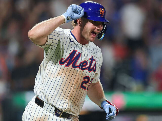 NEW YORK, NEW YORK - AUGUST 12: Pete Alonso #20 of the New York Mets reacts after hitting a solo home run during the sixth inning of the game against the Atlanta Braves at Citi Field on August 12, 2025 in New York City.