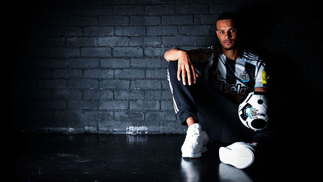 NEWCASTLE UPON TYNE, ENGLAND - AUGUST 12: Malick Thiaw poses for photos in a home shirt after signing for Newcastle United on August 12, 2025 in Newcastle upon Tyne, England.