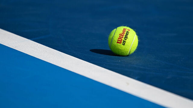 MASON, OHIO - AUGUST 08: A Wilson US Open 4 ball is seen during the Women's Singles First Round match on day two of the Cincinnati Open 2025 at Lindner Family Tennis Center on August 08, 2025 in Mason, Ohio.