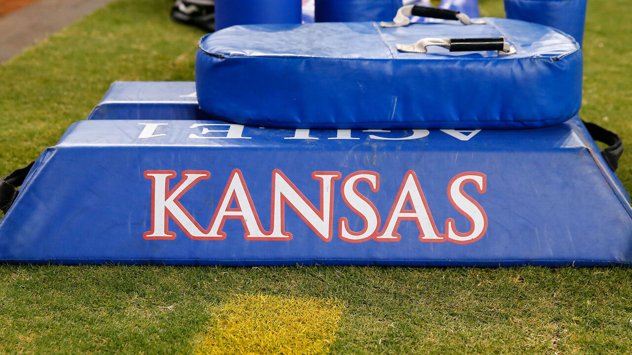PHOENIX, AZ - DECEMBER 26: The Kansas Jayhawks logo on a mat during the Guaranteed Rate Bowl college football game between the Kansas Jayhawks and the UNLV Rebels on December 26, 2023 at Chase Field in Phoenix, Arizona.