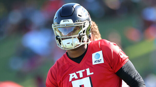 FLOWERY BRANCH, GA - JULY 27: Atlanta Falcons quarterback Michael Penix Jr. #9 runs a play during Atlanta Falcons training camp on July 27, 2025 at IBM Performance Field in Flowery Branch, GA.