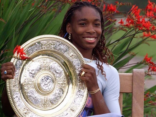 US player Venus Williams poses with the Wimbledon Ladies' Singles champion plate -- the 'Venus Rosewater Dish' which was first won by the Champion when the challenge round was introduced in 1886 -- as she poses during a photocall after winning her final match at the Wimbledon 2000 tennis tournament against compatriot Lindsay Davenport, 08 July 2000. Williams won the match 6-3, 7-6. (ELECTRONIC IMAGE) EPA PHOTO EPA/GERRY PENNY/mb/kr
