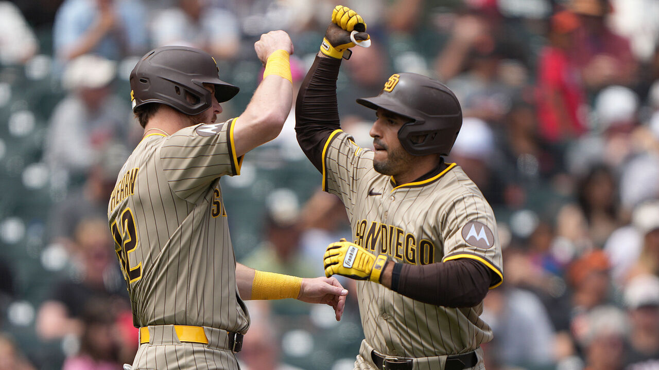 SAN FRANCISCO, CALIFORNIA - AUGUST 13: Ramón Laureano #5 and Ryan O'Hearn #32 of the San Diego Padres celebrates after Laureano hit a two-run home run against the San Francisco Giants in the top of the fifth inning at Oracle Park on August 13, 2025 in San Francisco, California.