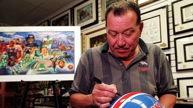 Lionel Taylor signs a helmet that has all three Broncos logo on it from the begining to present. There were also less than 300 limited editions of artwork sign by the ring of fame players that will be made available to the public 11/6/2000 at Fascination Street Gallery. This is to comemerate the History of Mile High Stadium.