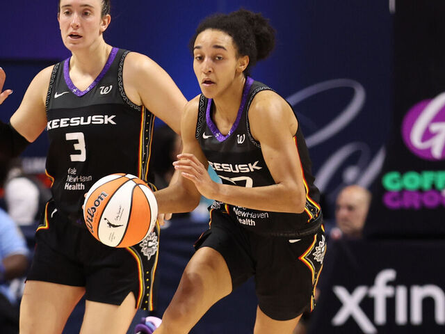 UNCASVILLE, CT - AUGUST 13: Leila Lacan #47 of the Connecticut Sun handles the ball during the game against the Chicago Sky on August 13, 2025 at the Mohegan Sun Arena in Uncasville, Connecticut. Mandatory Copyright Notice: Copyright 2025 NBAE