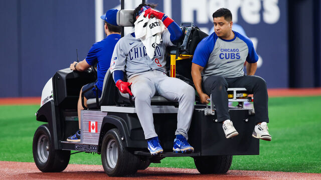 TORONTO, CANADA - AUGUST 13: Miguel Amaya #9 of the Chicago Cubs leaves the field on a cart after sustaining an injury in the eighth inning of their MLB game against the Toronto Blue Jays at Rogers Centre on August 13, 2025 in Toronto, Ontario, Canada.