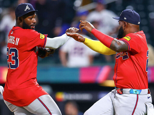 NEW YORK, NY - AUGUST 13: Michael Harris II #23 and Marcell Ozuna #20 of the Atlanta Braves celebrate after winning the game between the Atlanta Braves and the New York Mets at Citi Field on Wednesday, August 13, 2025 in New York, New York.