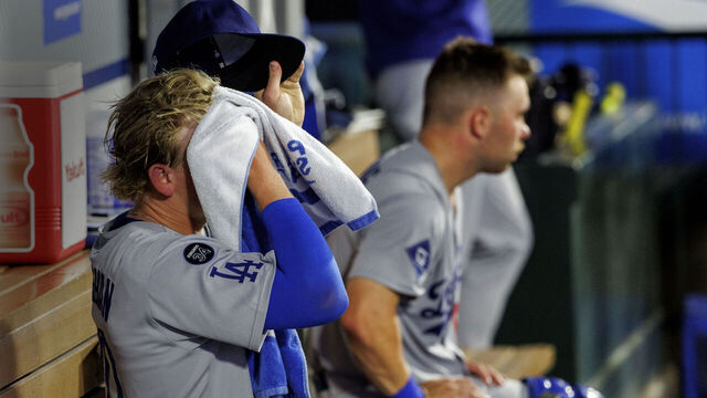 ANAHEIM, CA -AUGUST 12, 2025: Los Angeles Dodgers pitcher Emmet Sheehan (80) towels off the sweat in the dugout against the Angels in the fifth inning at Angel Stadium on August 12, 2025 in Anaheim, California.(Gina Ferazzi / Los Angeles Times via Getty Images)