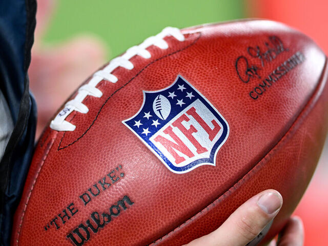BALTIMORE, MARYLAND - AUGUST 07: A view of the NFL Logo on a football in the game between the Baltimore Ravens and the Indianapolis Colts during the NFL Preseason 2025 game at M&T Bank Stadium on August 07, 2025 in Baltimore, Maryland.