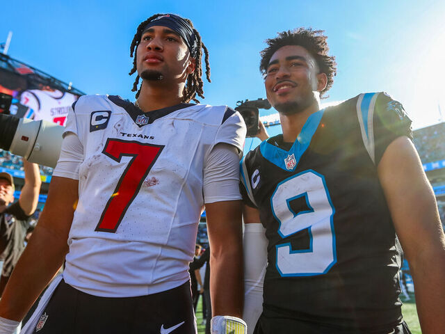 CHARLOTTE, NC - OCTOBER 29: Bryce Young #9 of the Carolina Panthers and C.J. Stroud #7 of the Houston Texans take a photo after a football game at Bank of America Stadium in Charlotte, North Carolina on Oct 29, 2023.