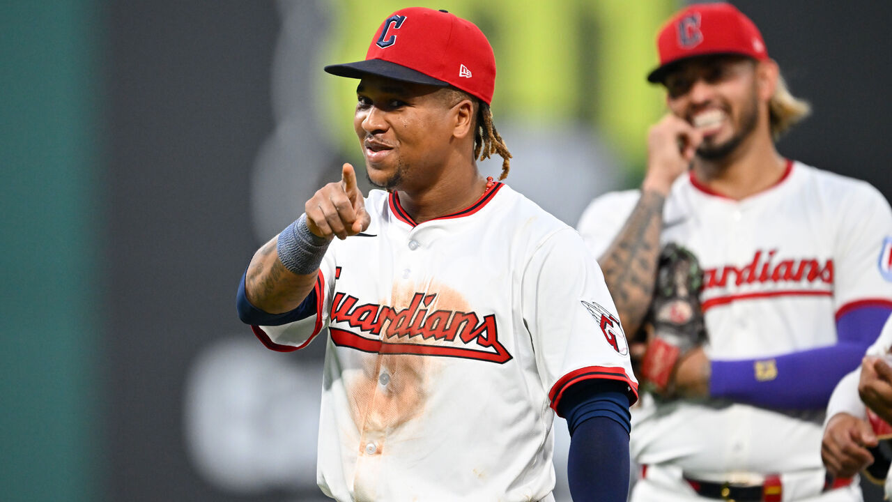 CLEVELAND, OHIO - AUGUST 14: José Ramírez #11 of the Cleveland Guardians jokes with the Miami Marlins dugout during the sixth inning at Progressive Field on August 14, 2025 in Cleveland, Ohio.