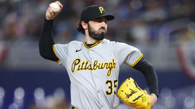 MIAMI, FLORIDA - MARCH 30: Colin Holderman #35 of the Pittsburgh Pirates pitches against the Miami Marlins in the seventh inning of the game at loanDepot park on March 30, 2025 in Miami, Florida.